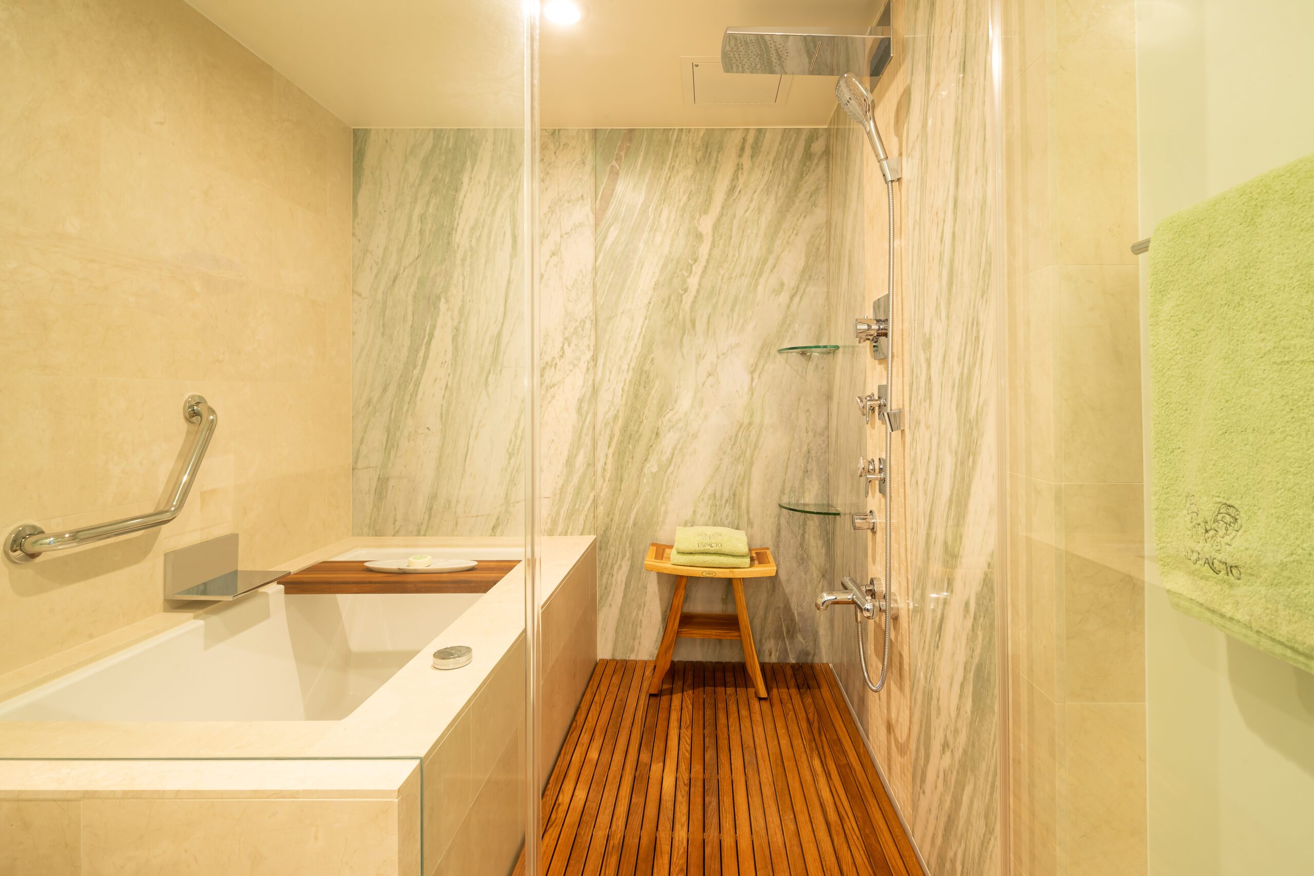 Marble shower with tub.