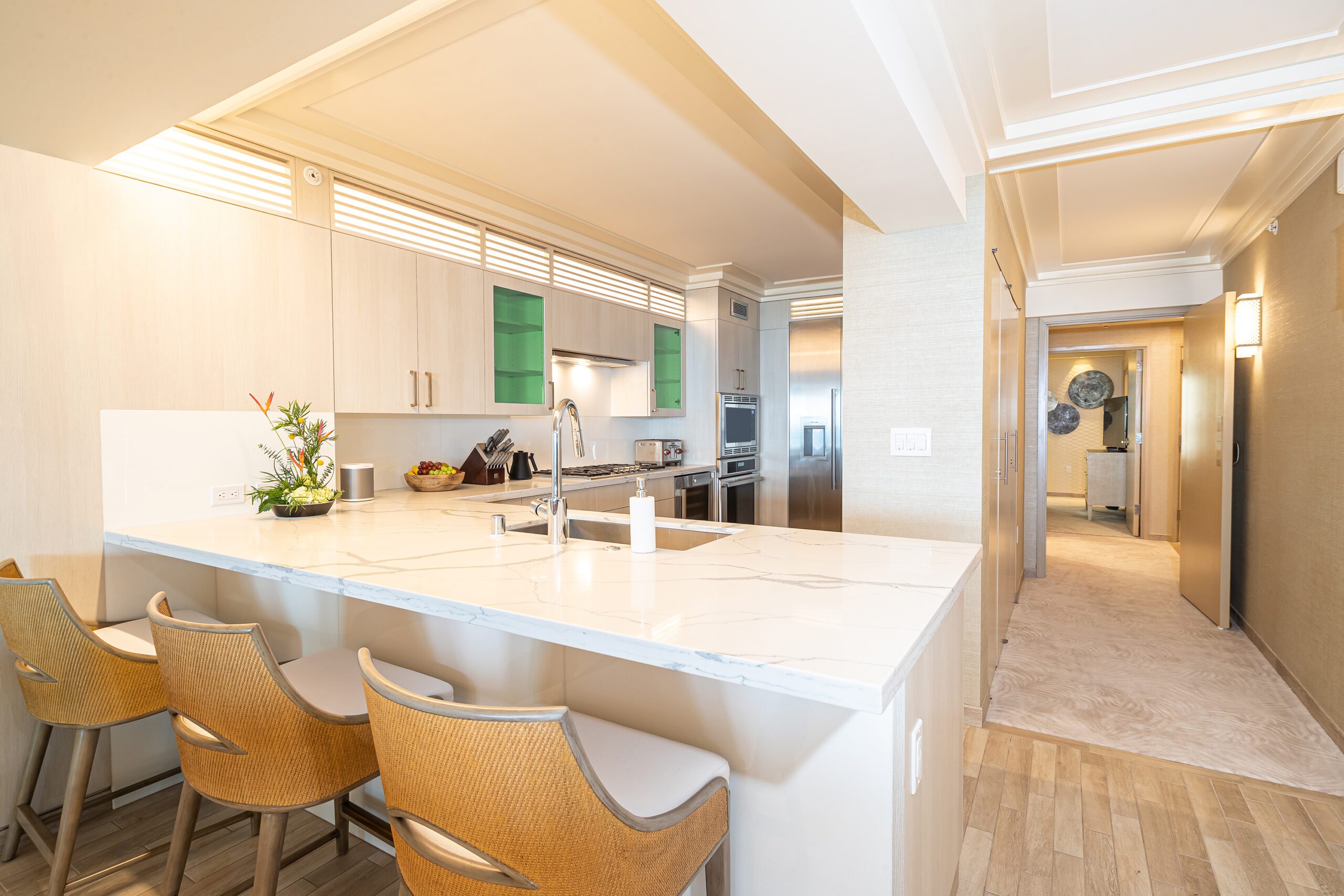 Kitchen with counter top seating.