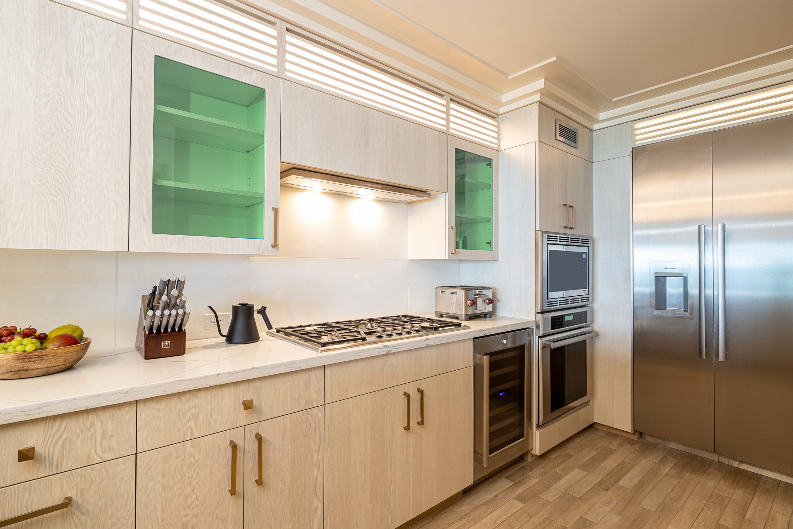 Kitchen with stove, oven, and refrigerator.