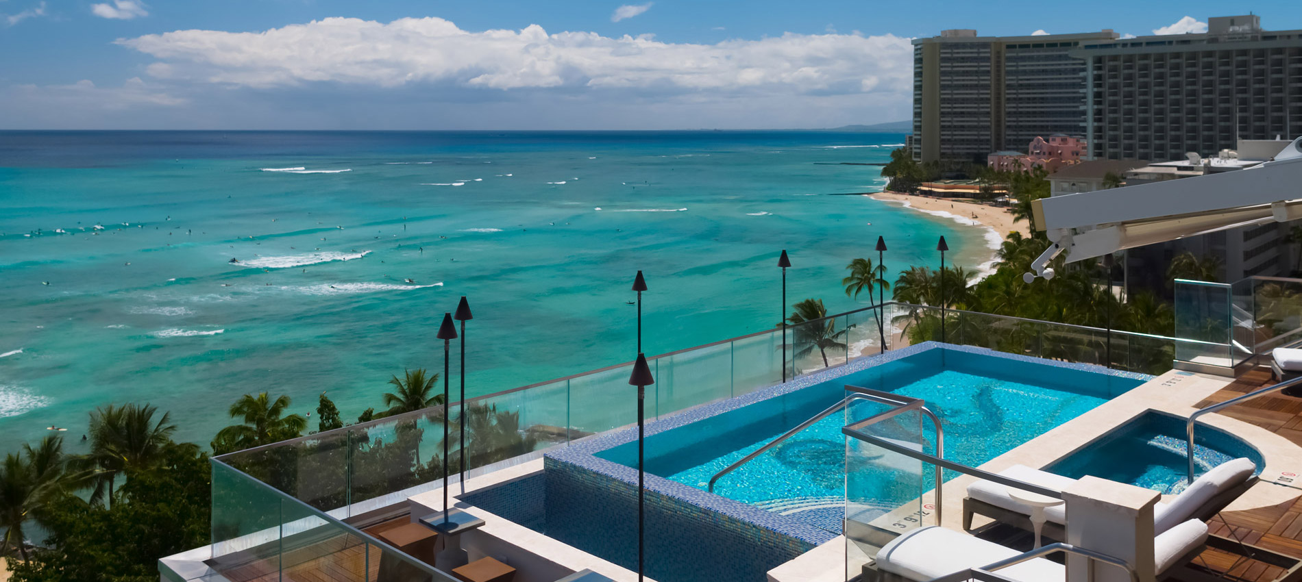 Infinity pool on the rooftop of ESPACIO, overlooking Waikiki Beach.