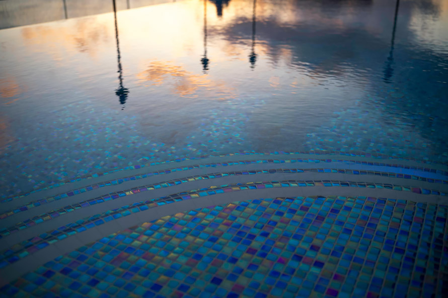 Mosaic of tiles in the pool.